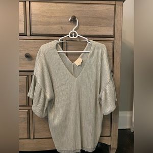 Women’s gold blouse